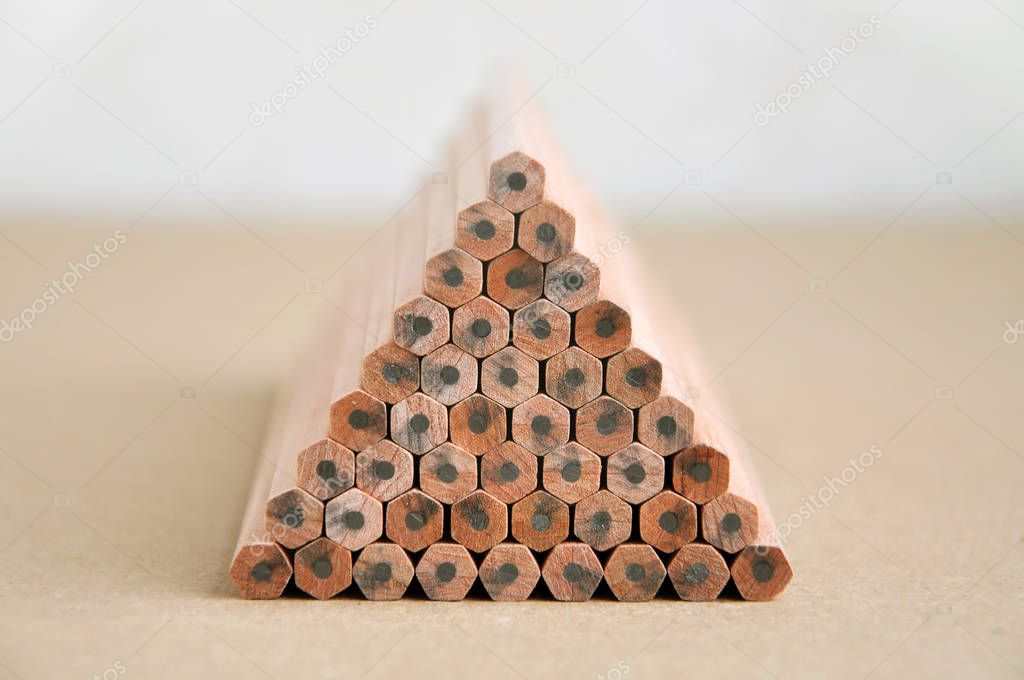Many wooden pencils lying on each other