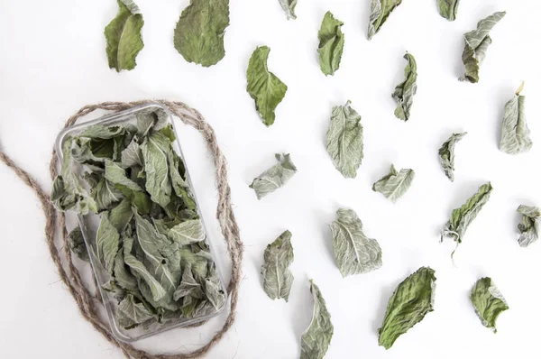 Box with dry mint leaves