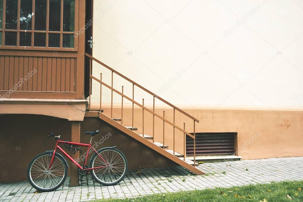 Bicycle parked near the stairs