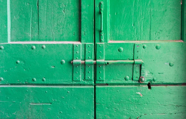 Old latch on old door — Stock Photo, Image