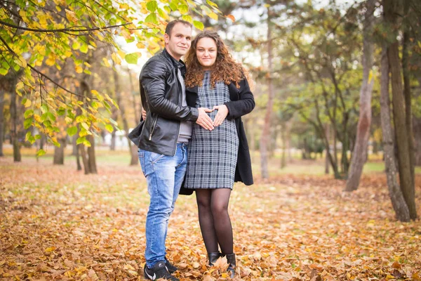 Happy Pregnant Couple Autumn Background — 图库照片