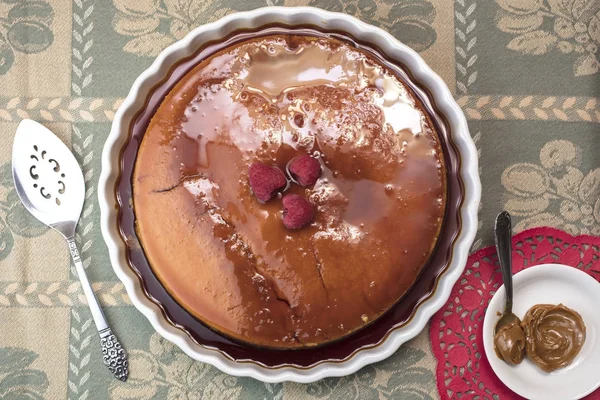 Creamy Flan dessert served  with raspberries and dulce de leche — Stock Photo, Image