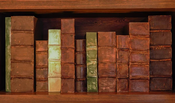 Antique books on old wooden shelf. Shelf with old books. — Stock Photo, Image