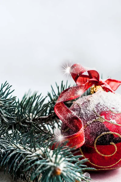 Christmas decorative red toy with a bow on a white background — Stock Photo, Image