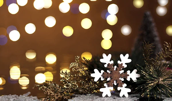 Decorative Christmas snowflake on a background of lights — Stock Photo, Image