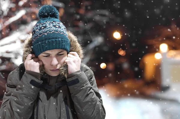 Serious young man on a city street — Stock Photo, Image