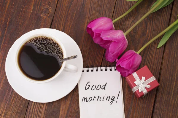 Cup of coffee, tulips and Good morning massage — Stock Photo, Image