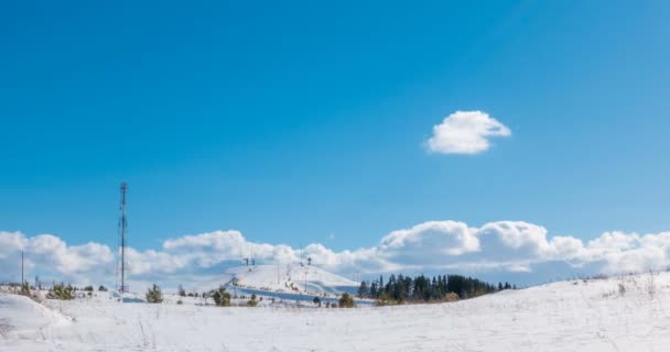 Long time lapse of clouds over winter landscape — Stock Video