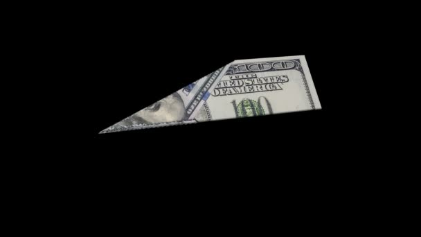 From a banknote a paper airplane is formed, the concept of prosperity growth, with alpha-canal and chromakey — Stock Video