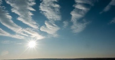 beautiful cloud space weather beautiful blue sky glow cloud background. Sky 4K clouds weather nature cloud blue Blue sky with clouds 4K sun Time lapse clouds 4k rolling puffy cloud movie