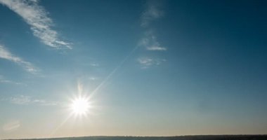 beautiful cloud space weather beautiful blue sky glow cloud background. Sky 4K clouds weather nature cloud blue Blue sky with clouds 4K sun Time lapse clouds 4k rolling puffy cloud movie
