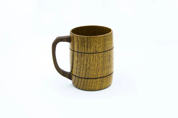 Wooden mug isolated on white background