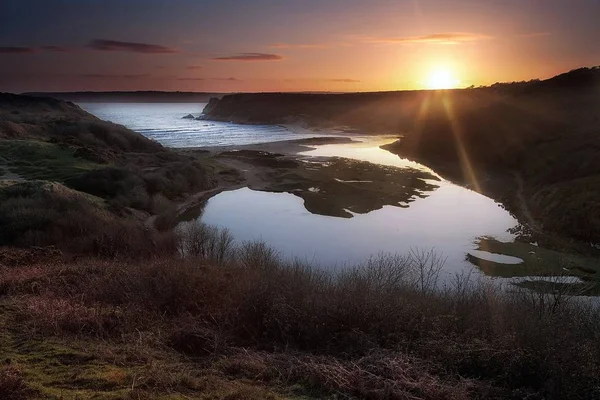 Tre klippor Bay sunset — Stockfoto