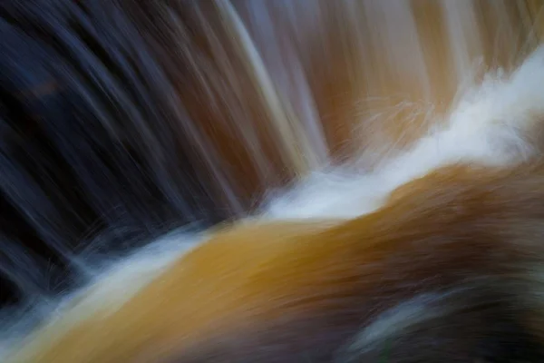 Abstraktní rozmazané barevné vodopád — Stock fotografie