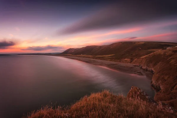 Solnedgång vid Rhossili Bay, South Wales — Stockfoto