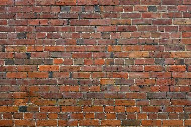 Yıkık kırmızı tuğla duvar