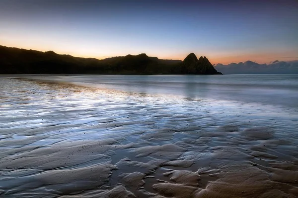 Daybreak at Three Cliffs Bay — Stock Photo, Image