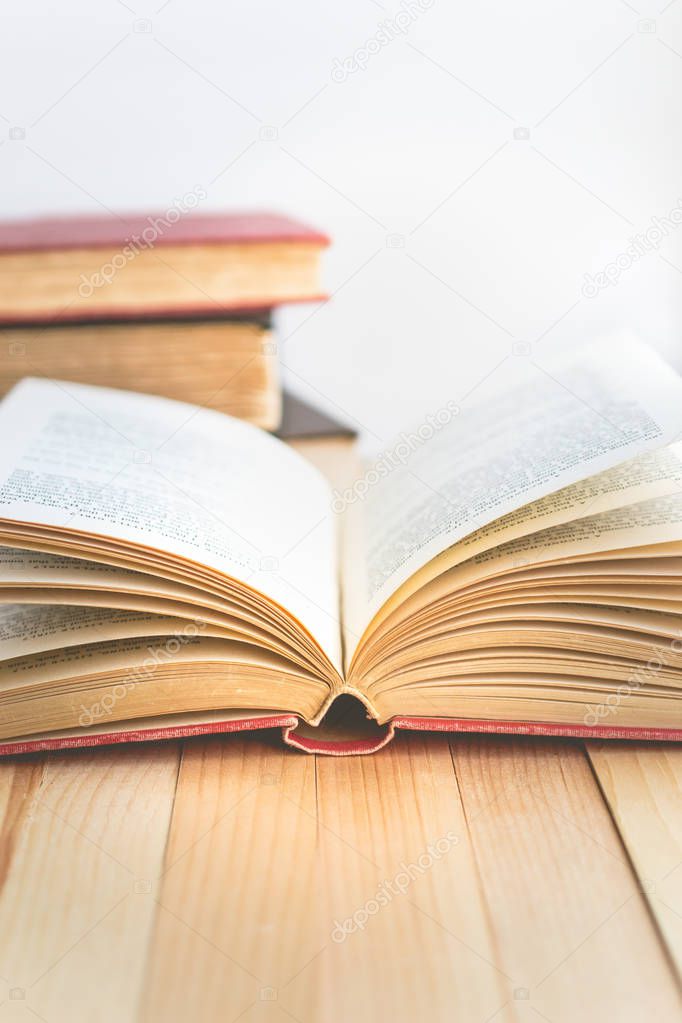 Open book and stack of books with copy space in relaxation and c