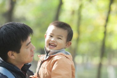 Mutlu gerçek Çince baba ve oğul