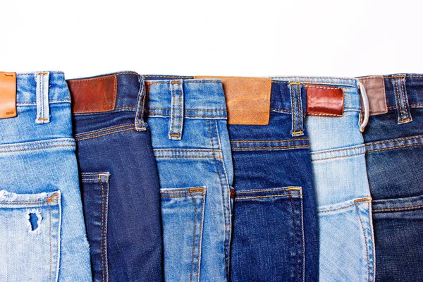 Jeans azul em uma fileira — Fotografia de Stock