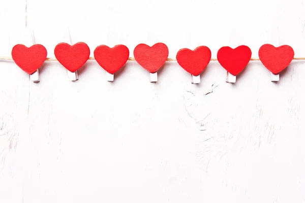 Red hearts in a row — Stock Photo, Image