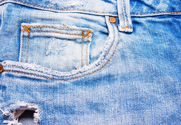 Calça jeans azul close-up no fundo branco — Fotografia de Stock