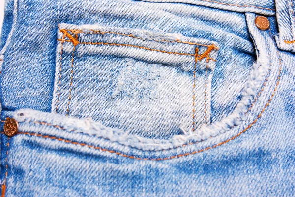 Calça jeans azul close-up no fundo branco — Fotografia de Stock