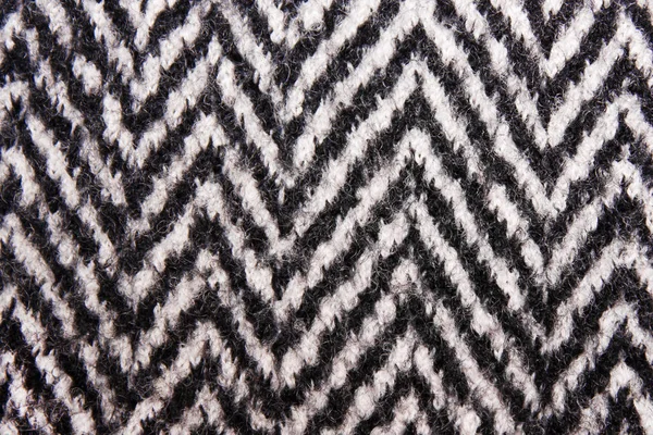 La texture del cappotto in lana bianca e nera . — Foto Stock