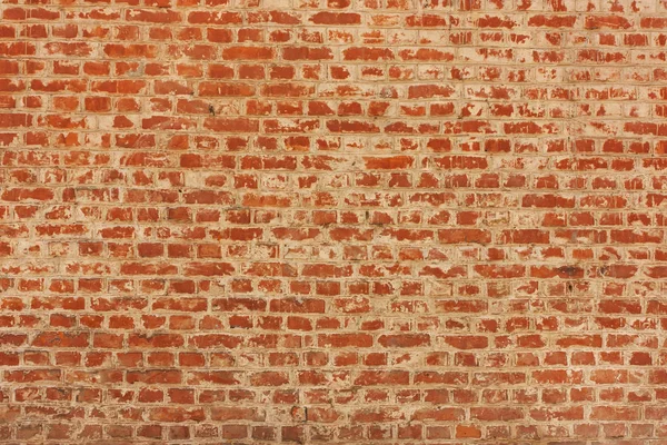 Fundo de uma parede de tijolo, alvenaria em uma fileira — Fotografia de Stock