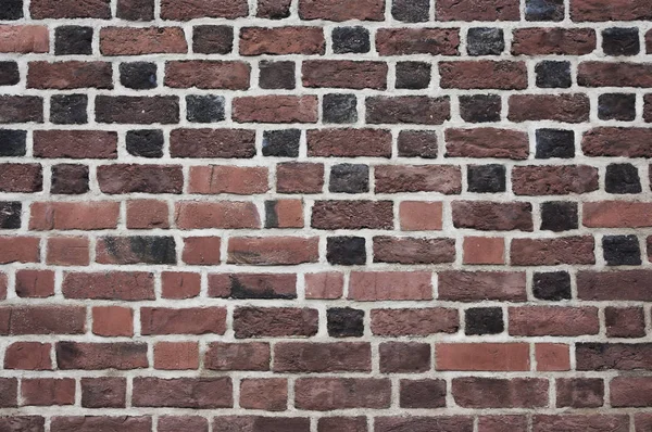 Laranja parede de tijolo vermelho — Fotografia de Stock