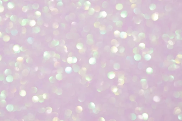 light pink background with sparkles