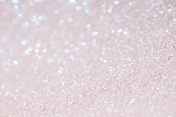 light pink background with sparkles