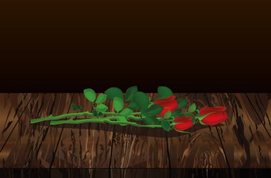 Üç kırmızı çiçek. Rose yatıyor. Metin veya adver için boş alan