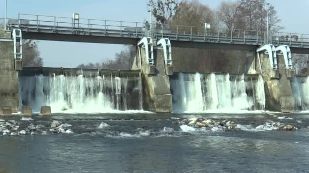 Weir On Morava River, Hydro-electric Power Station, in winter frozen water with ice and icicles snow, sky blue, Europe — Stock Video