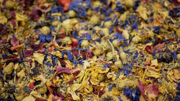 Herbal tea dried blend mixture of rose, cornflower, hibiscus, thyme leaf petals and mother-of-tea for high-quality teas as well as decorative. traditional folk medicine, diseases hectic stressful