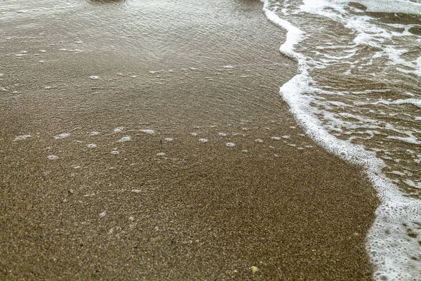 Sombere zand strand scène — Stockfoto