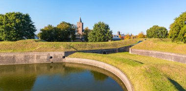 Panorama of rampart and church of Naarden, Netherlands clipart