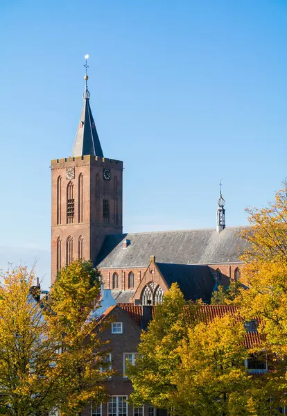 Church in autumn, Naarden, Netherlands - vertical — Stock Photo, Image