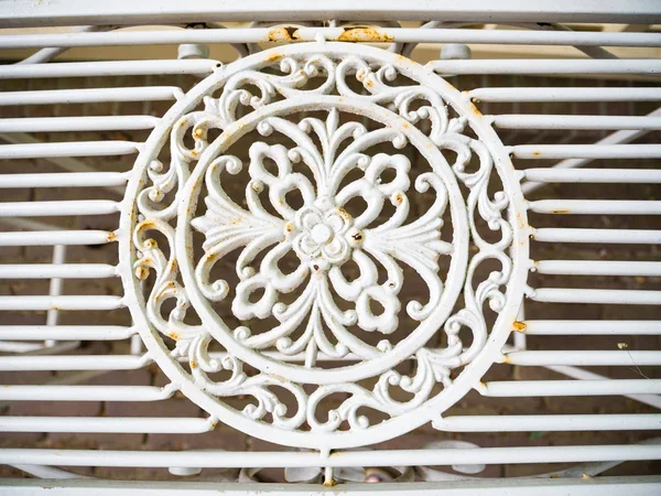 Detail of classic vintage ornament as decoration in cast iron wh — Stock Photo, Image
