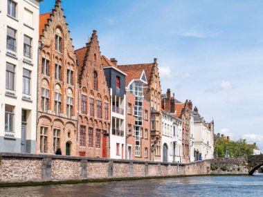 Historic old and new facades of houses along Spiegelrei canal in Bruges, Belgium