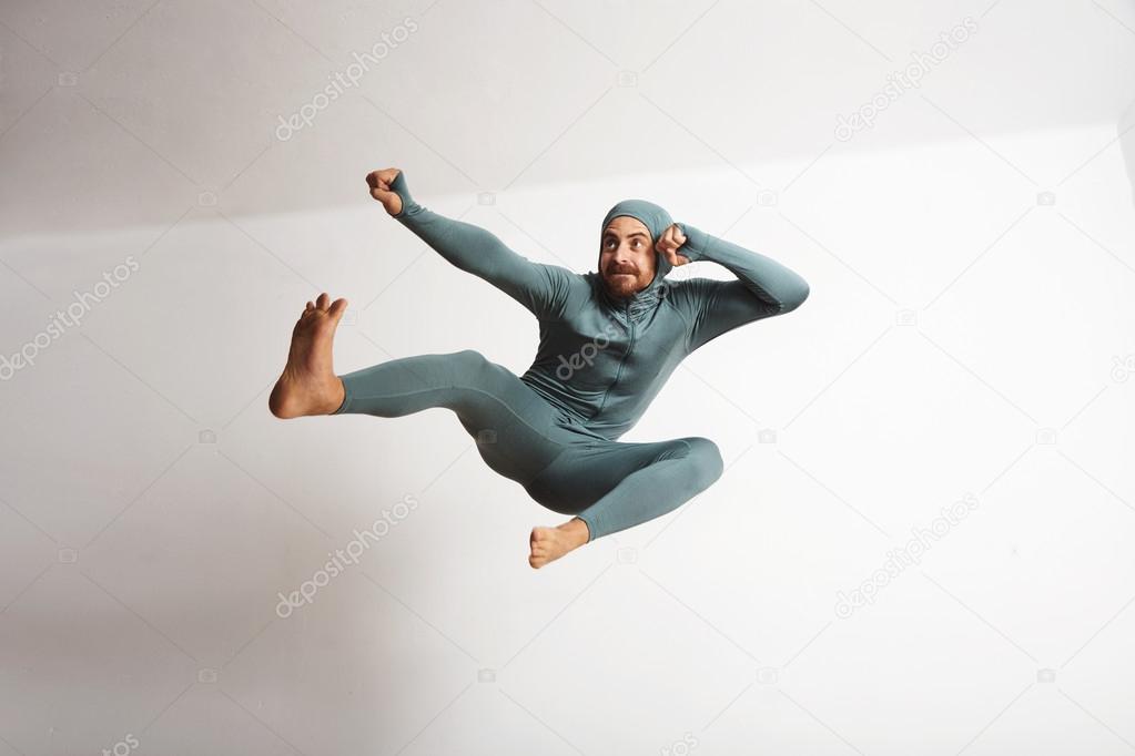 athlete male acting like ninja