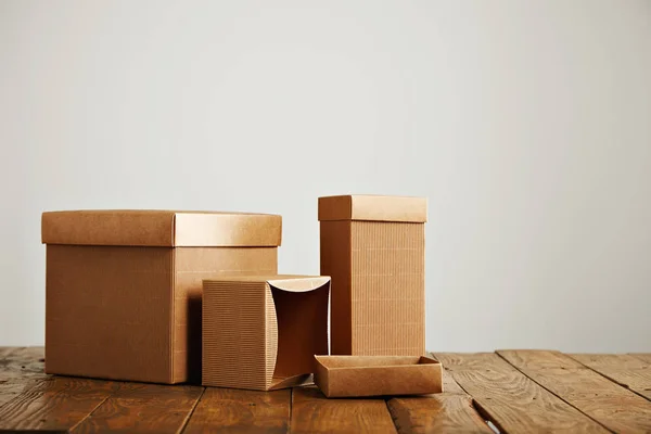 Mockups of blank brown corrugated cardboard boxes — Stock Photo, Image