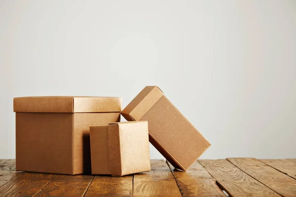 Mockups of blank brown corrugated cardboard boxes — Stock Photo, Image