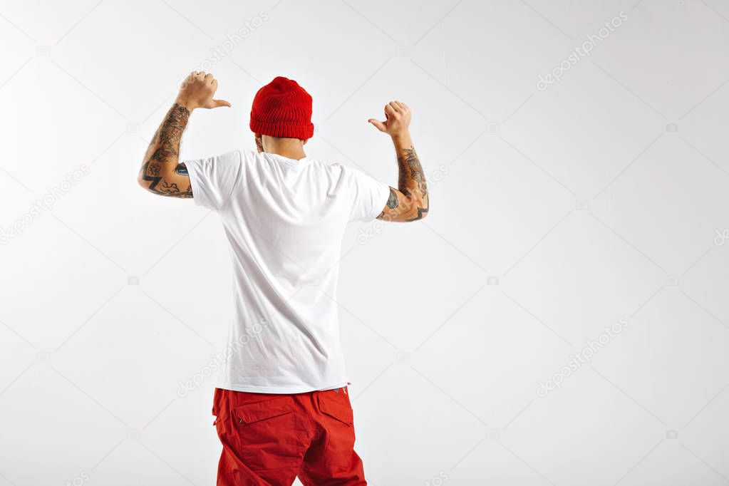 Snowboarder showing back of unlabeled white t-shirt