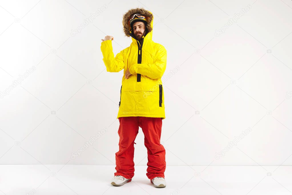 Snowboarder demonstrating bright anorak coat
