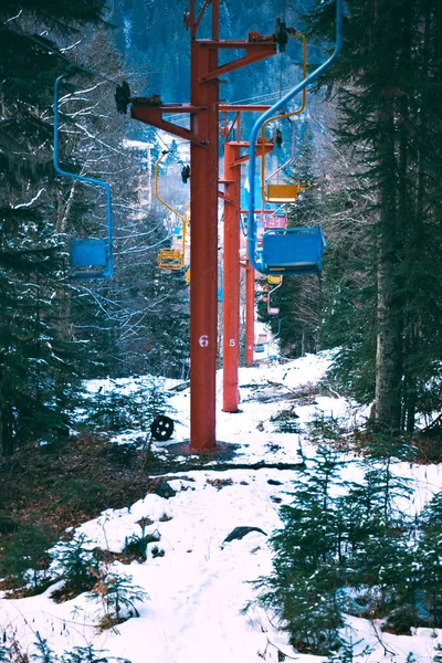 Old vintage ski lift with colorful chairs — Stock Photo, Image