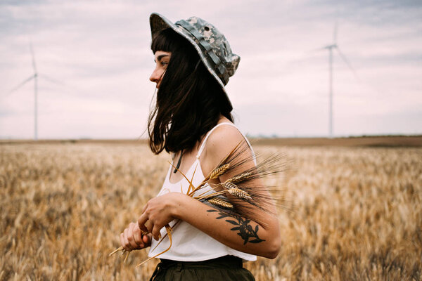 girl walking in wheat field