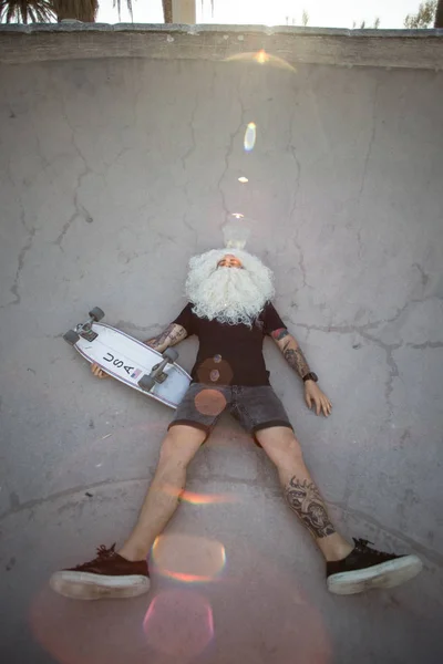 Santa Claus s skateboard — Stock fotografie