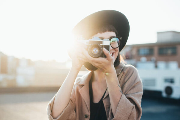 hipster woman with camera