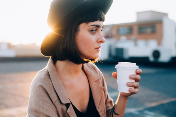 Beautiful young woman in hat